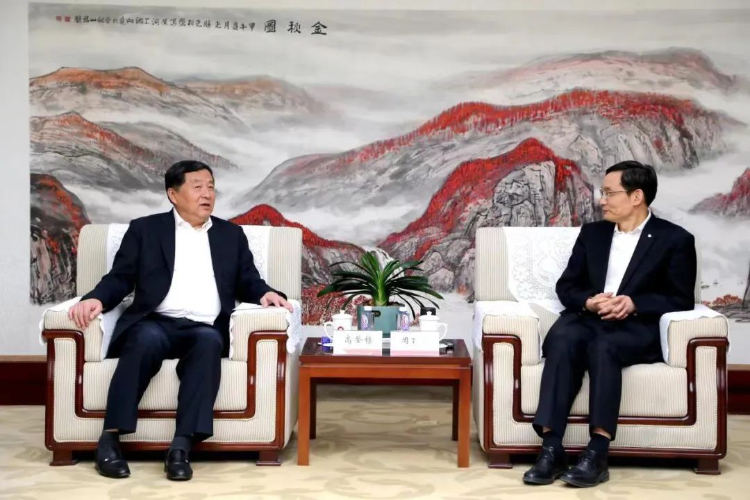 		周育先会见中国水泥协会会长高登榜一行_优德88要闻_优德88集团有限公司	